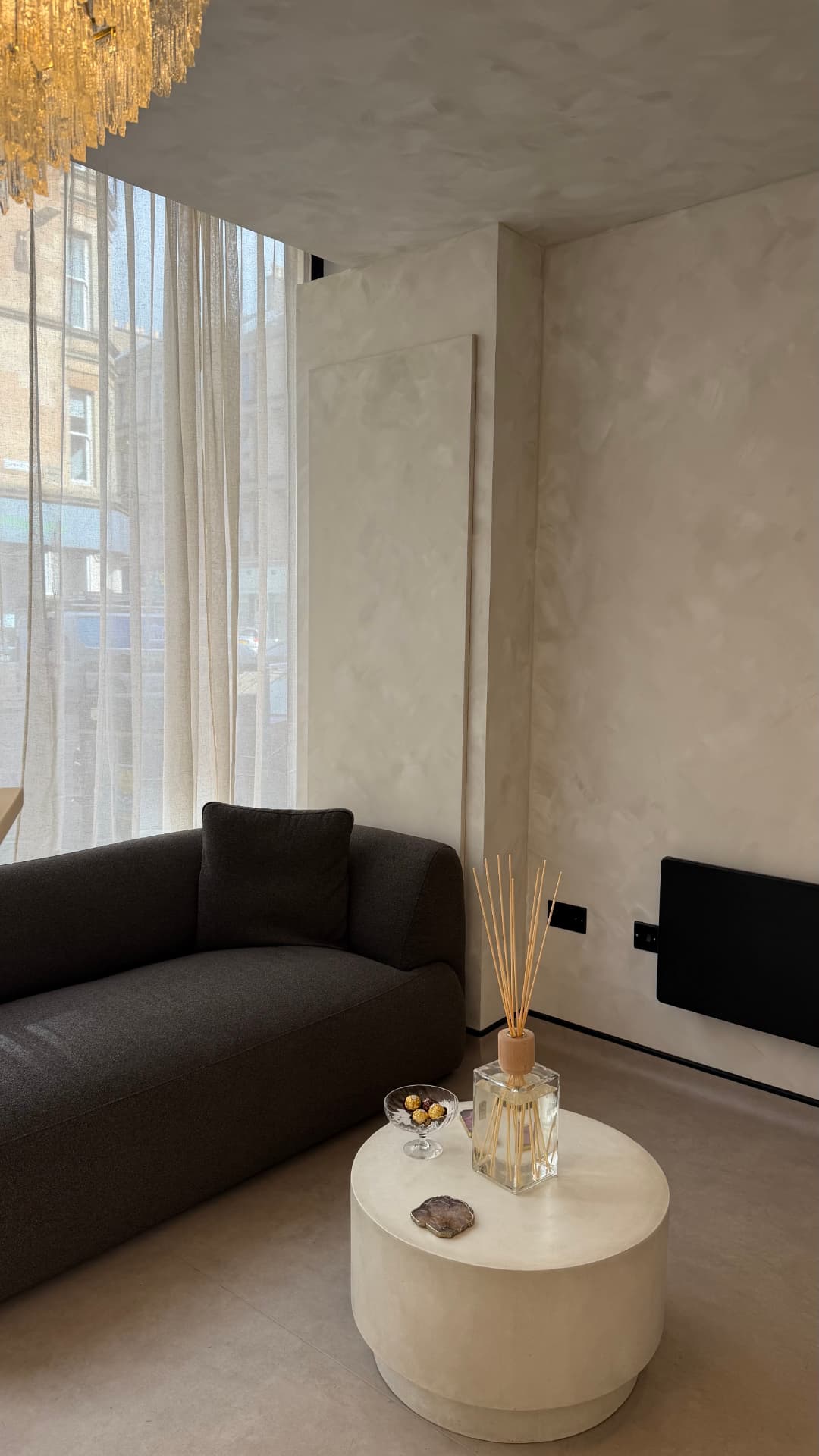 Calm waiting area at Kove Clinic in Glasgow before a facial aesthetics appointment